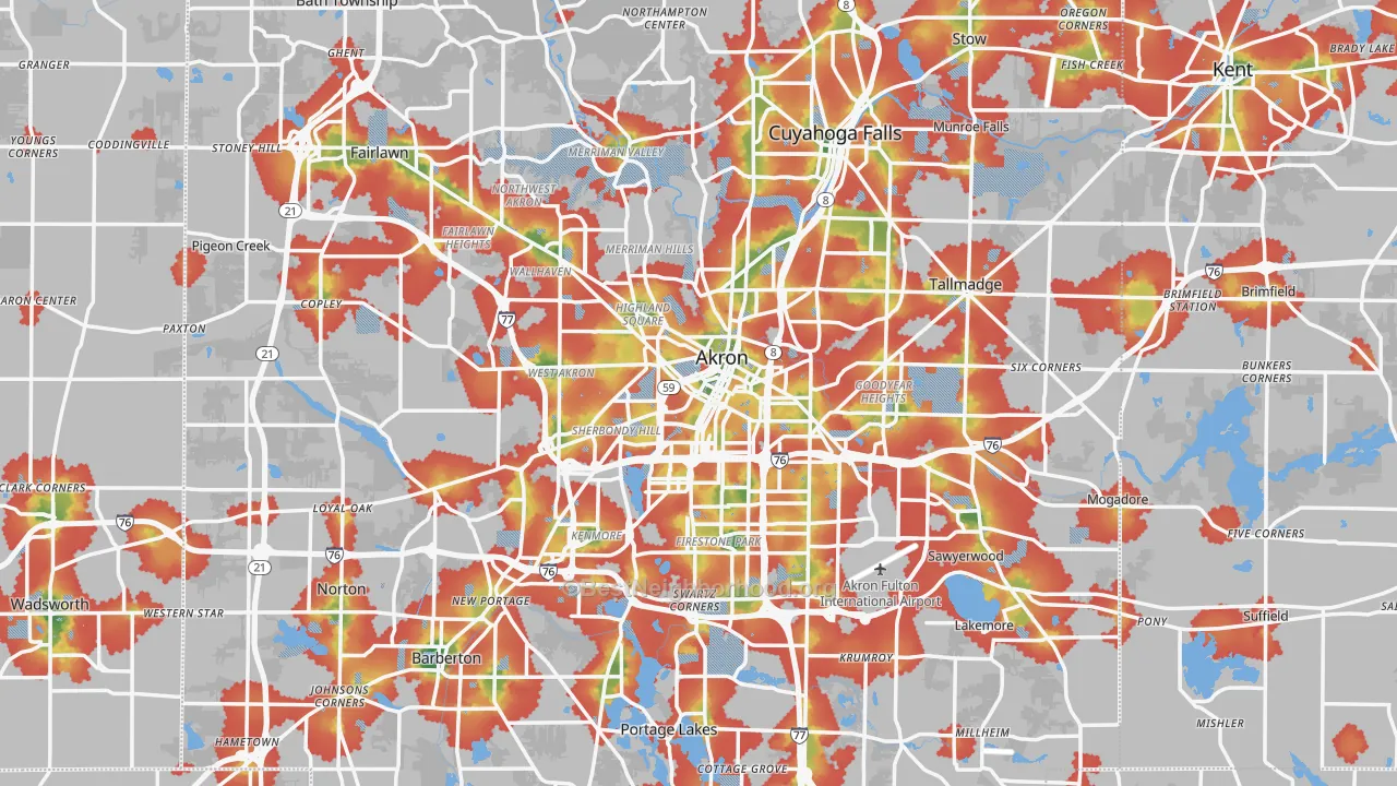 Walk Grade map of Akron, OH, walkable areas in green and car-dependent areas in red