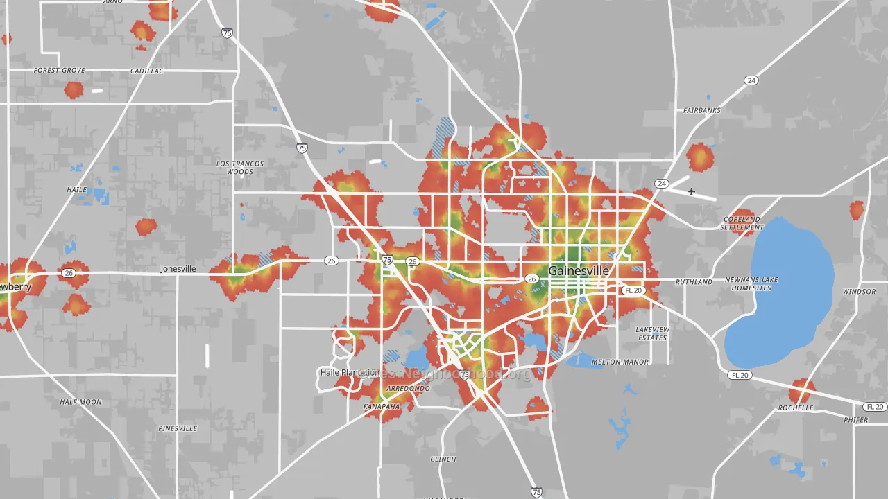 Walk Grade map of Alachua County, FL, walkable areas in green and car-dependent areas in red