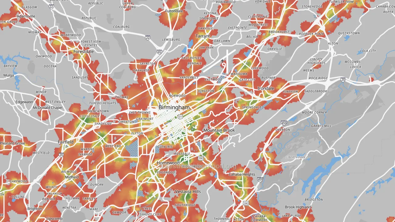 Walk Grade map of Birmingham, AL, walkable areas in green and car-dependent areas in red
