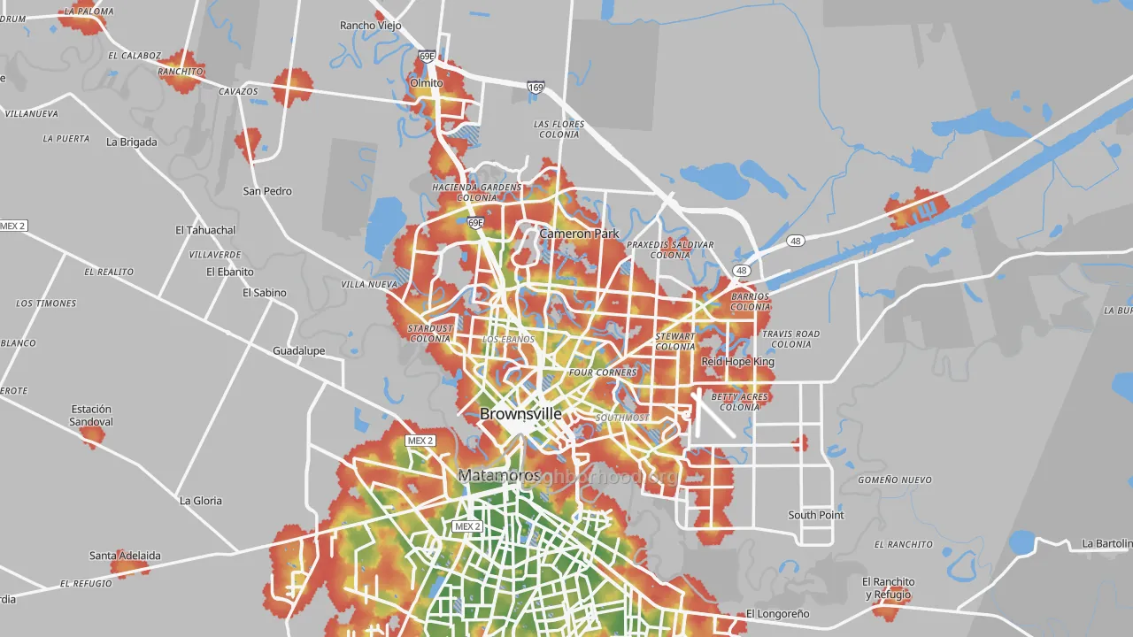 Walk Grade map of Brownsville, TX, walkable areas in green and car-dependent areas in red