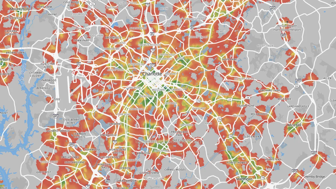Walk Grade map of Charlotte, NC, walkable areas in green and car-dependent areas in red