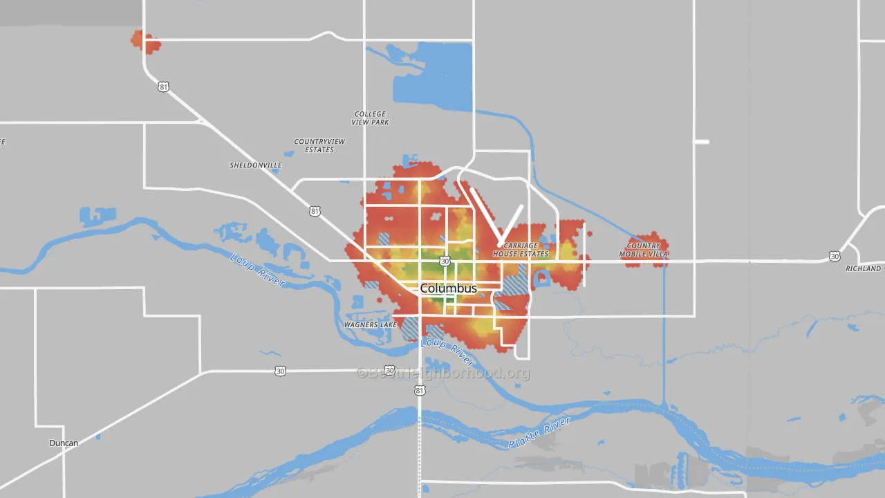 Walk Grade map of Columbus, NE, walkable areas in green and car-dependent areas in red