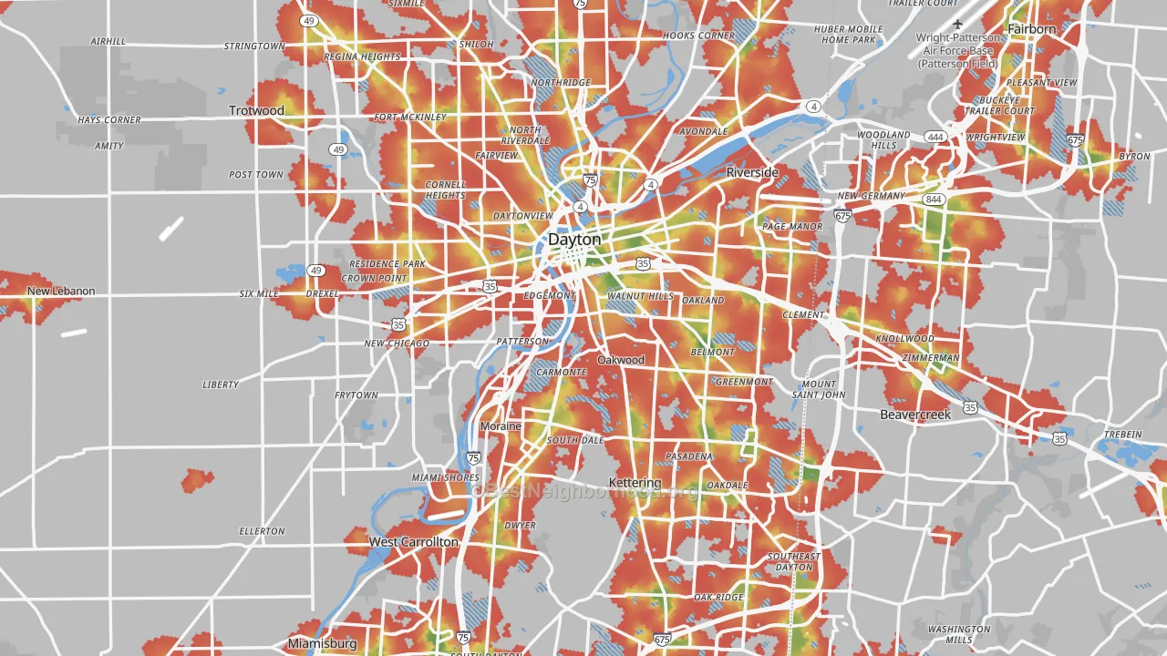 Walk Grade map of Dayton, OH, walkable areas in green and car-dependent areas in red