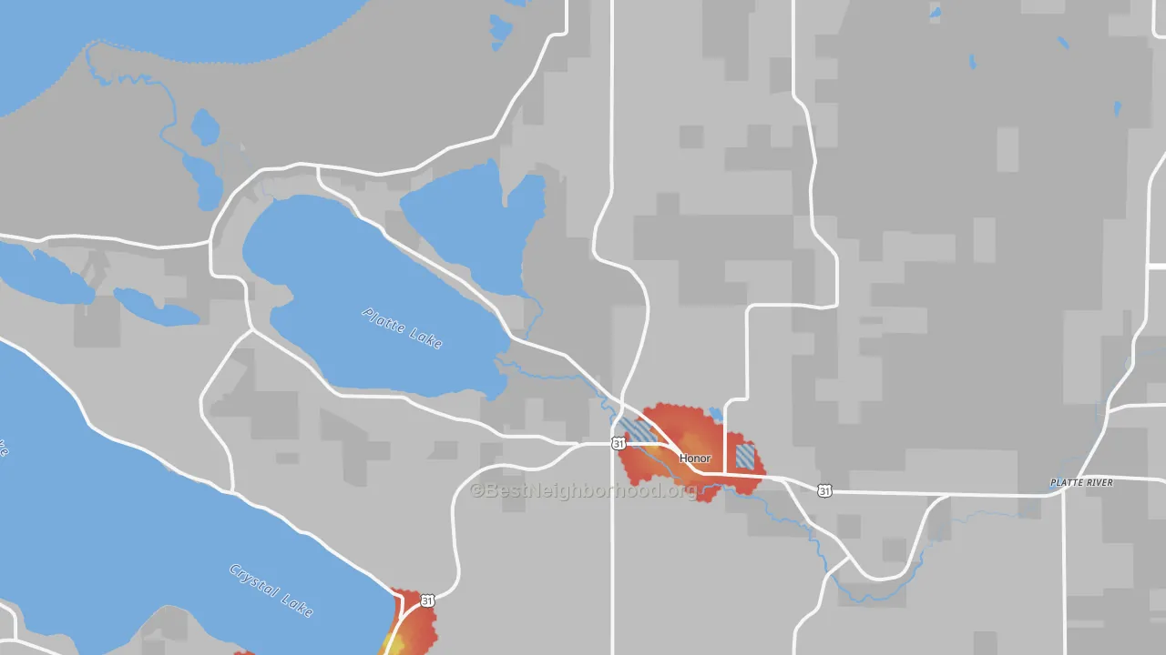 Walk Grade map of Honor, MI, walkable areas in green and car-dependent areas in red