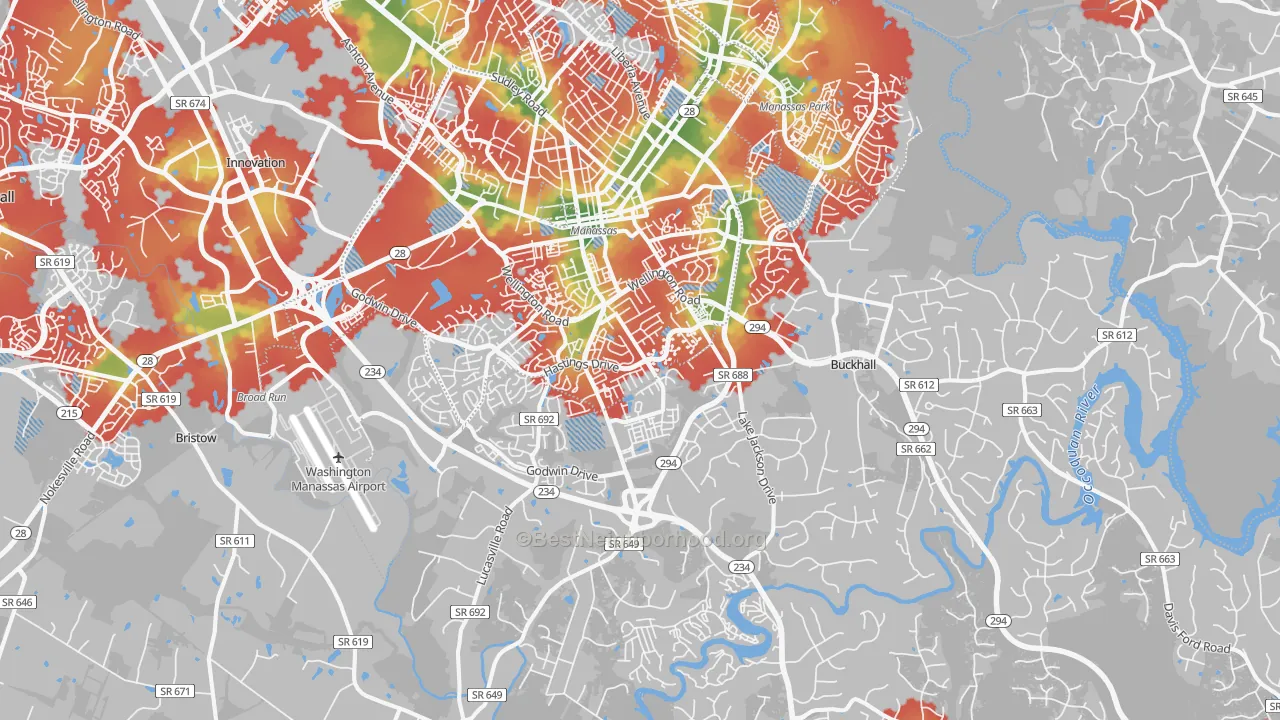 Walk Grade map of Manassas, VA, walkable areas in green and car-dependent areas in red