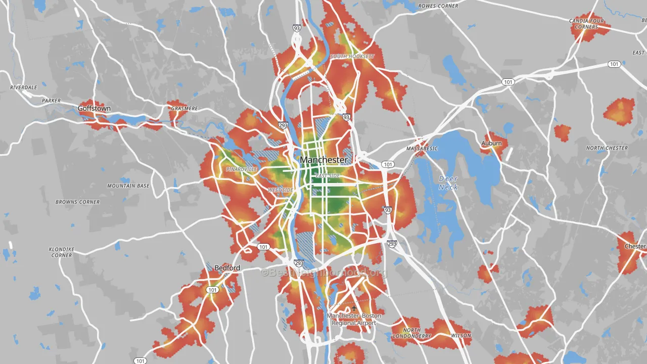 Walk Grade map of Manchester, NH, walkable areas in green and car-dependent areas in red