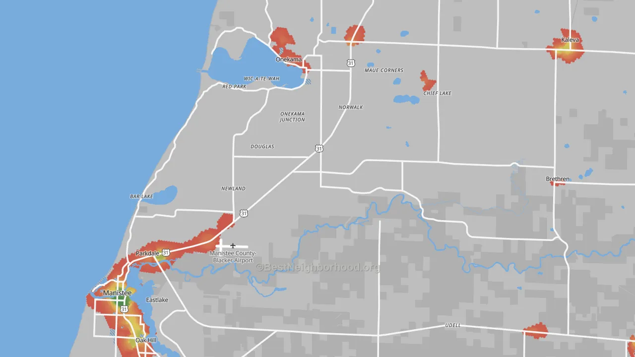 Walk Grade map of Manistee County, MI, walkable areas in green and car-dependent areas in red