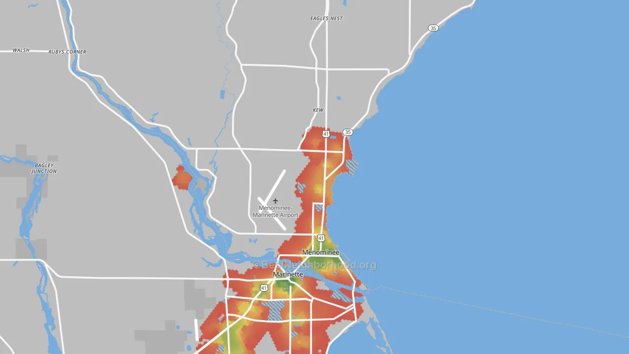 Walk Grade map of Menominee, MI, walkable areas in green and car-dependent areas in red