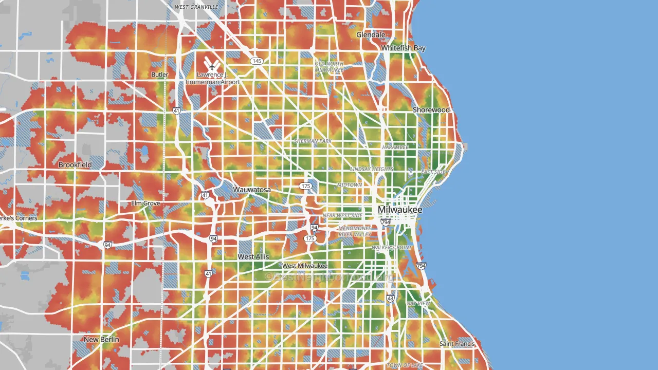 Walk Grade map of Milwaukee, WI, walkable areas in green and car-dependent areas in red
