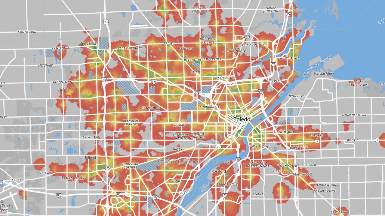 Walk Grade map of Toledo, OH, walkable areas in green and car-dependent areas in red