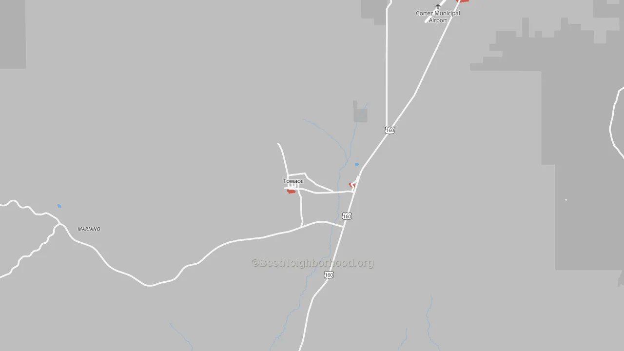 Walk Grade map of Towaoc, CO, walkable areas in green and car-dependent areas in red