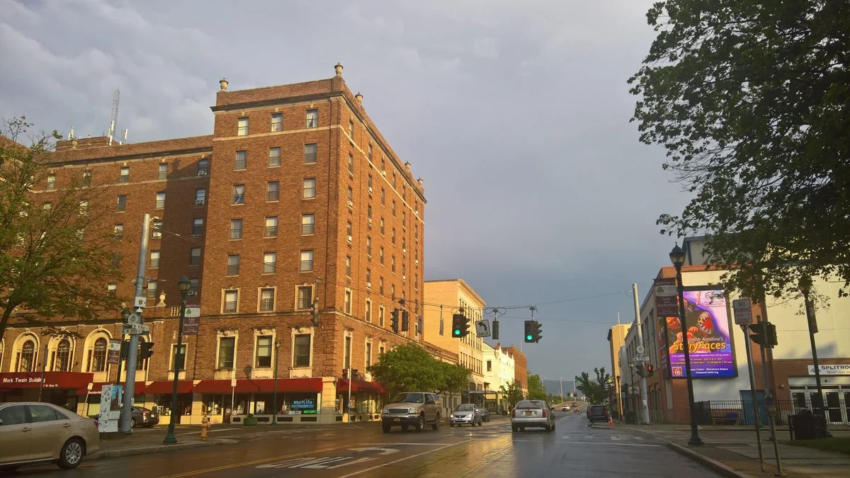 Looking south along North Main Street from Wisner Park in downtown Elmira, New York, toward the bridge over the Chemung River, June 2017
