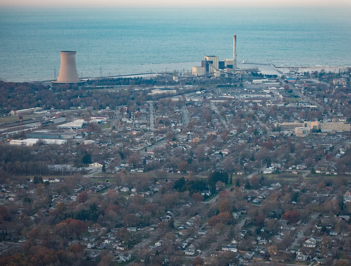 This is an aerial photograph of Michigan City, IN. The viewer is looking North towards the lake