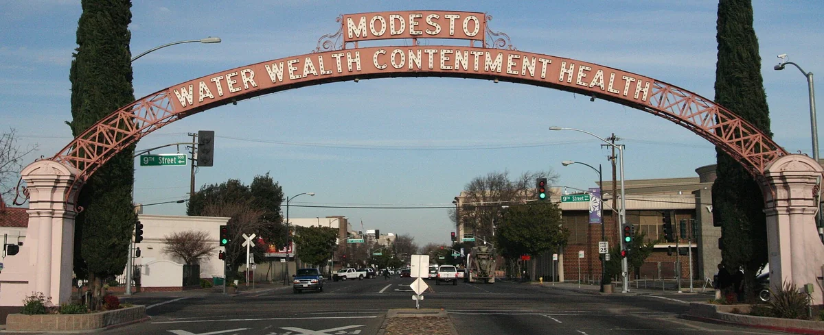 The Modesto Arch, first erected in 1912, by a level crossing in Modesto, north central California