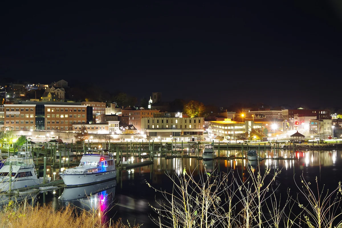 Norwich Connecticut as seen from across the harbor, at night