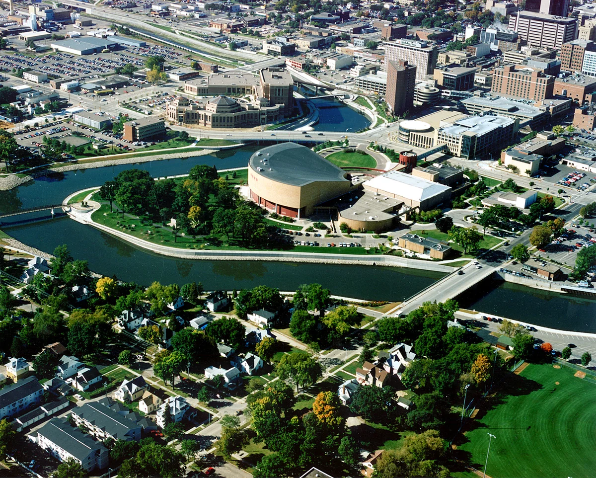 Aerial view of the city center of Rochester, Minnesota, USA. The South Fork of the Zumbro River winds its way through the center of town. The Rochester Art Center sits in the foreground in a bend in the river.
