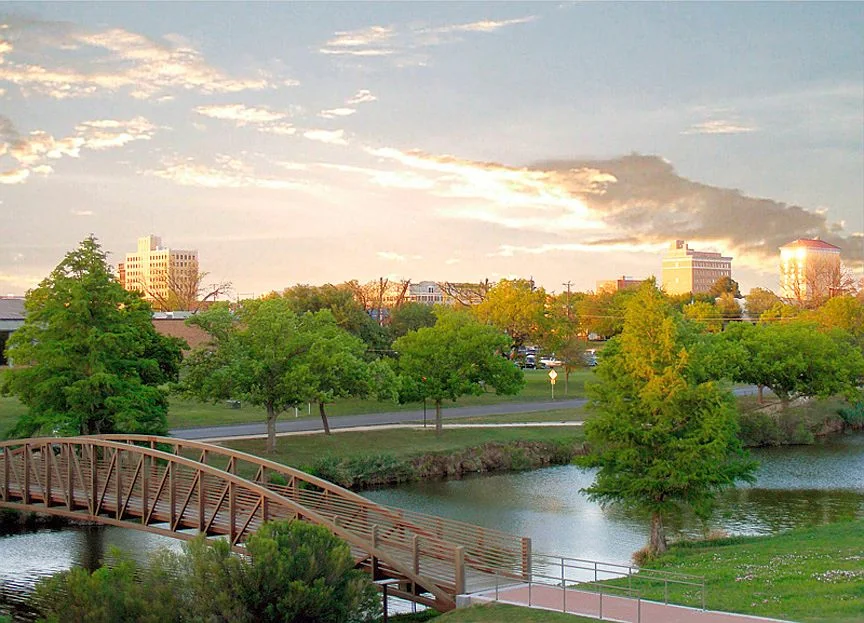 Park along the Concho River in San Angelo, Texas at sunset